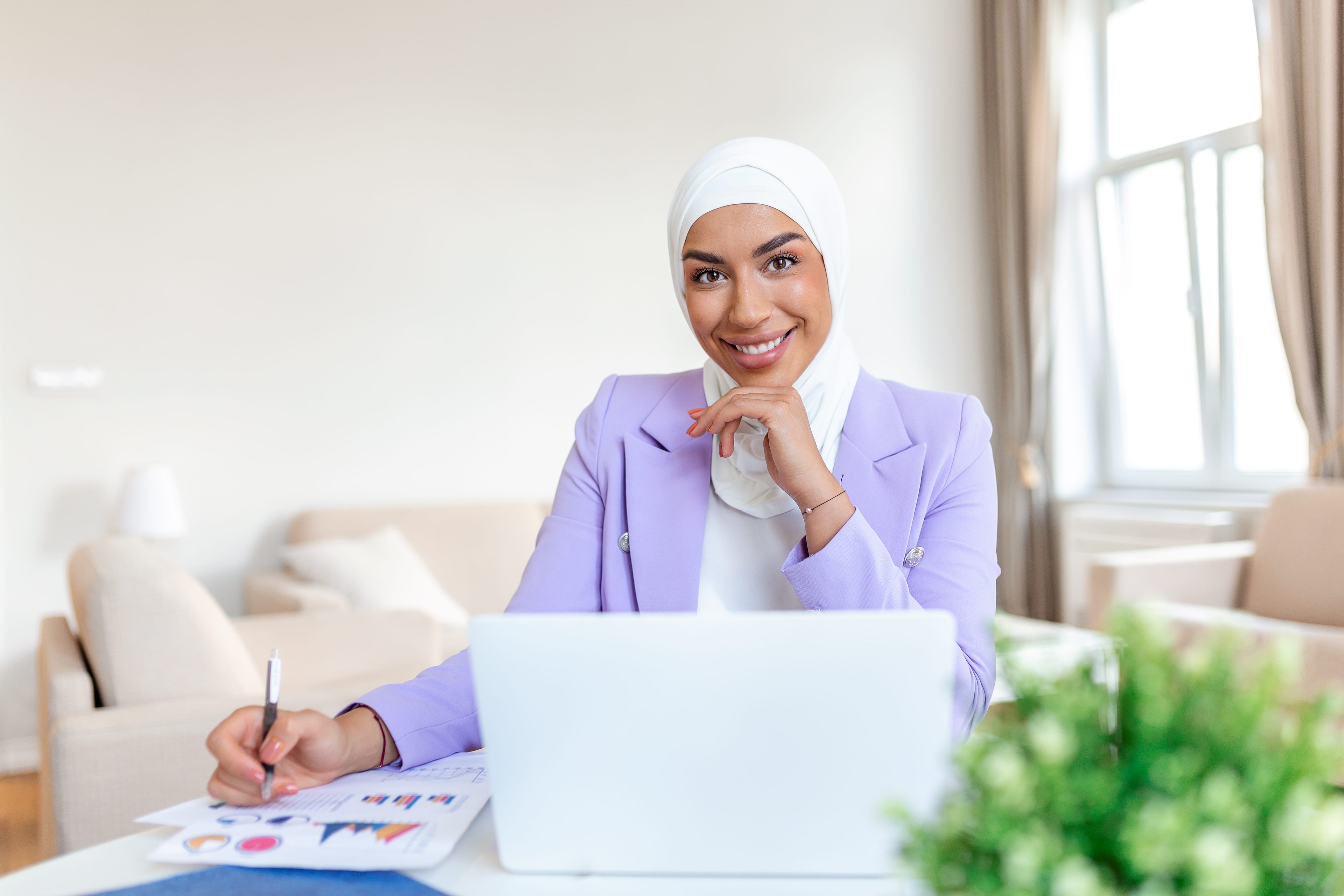 Professional smiling in workplace setting